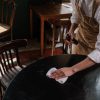Wiping down table