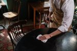 Wiping down table