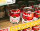 Campbell's Chicken Noodle Soup cans on a shelf